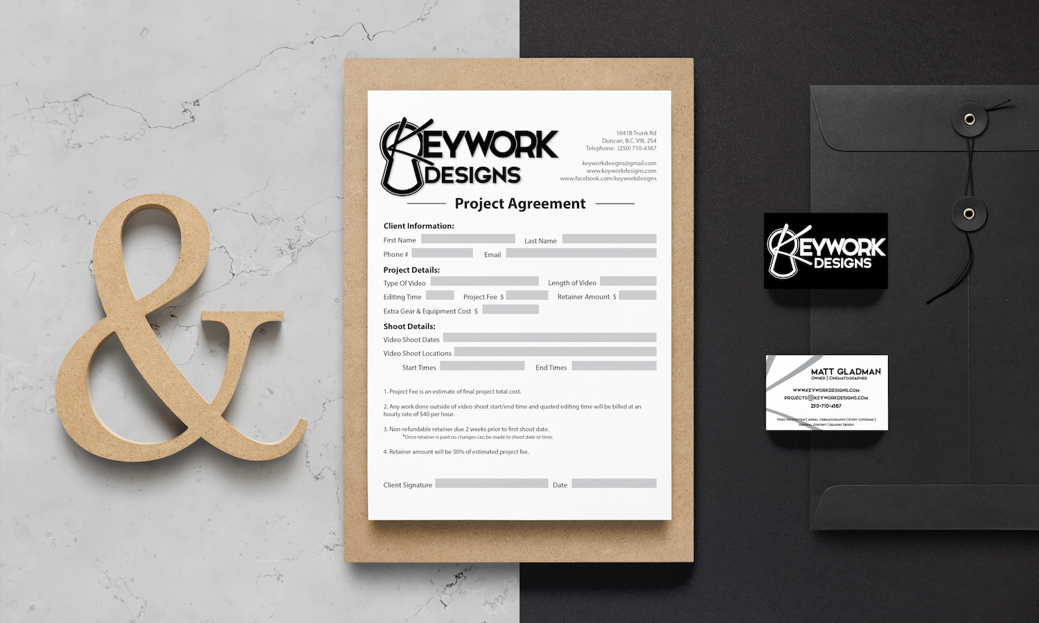 Mockup of branded stationary. Business cards with a logo on one side and information on the other and a example contract page in the middle.